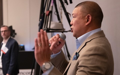 a man holding a microphone