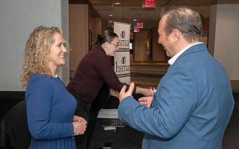 a group of people standing in a room