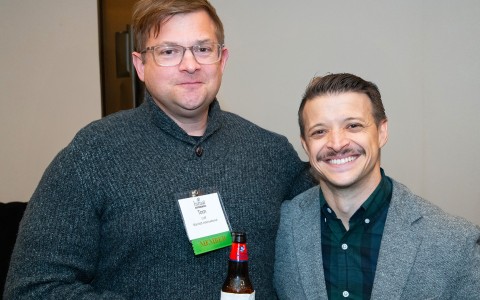 two men posing for a picture