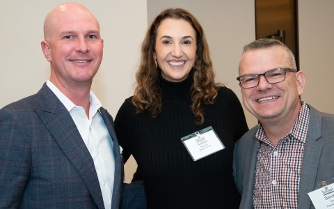 a group of people posing for a photo