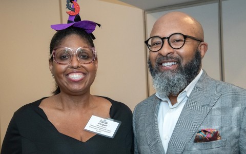 a man and woman smiling at camera