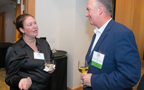 a man and woman talking to each other