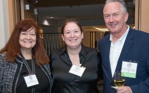 a group of people posing for a photo