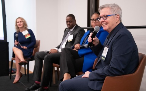 a group of people sitting in chairs