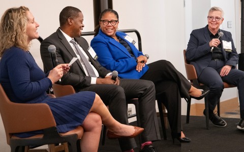 a group of people sitting in chairs