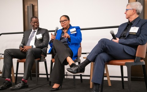 a group of people sitting in chairs
