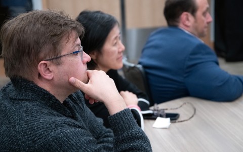 a man and woman sitting at a table