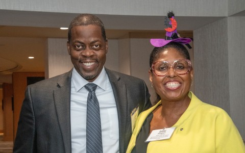a man and woman smiling at camera