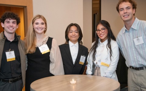 a group of people posing for a photo
