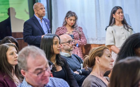 a group of people sitting in a room