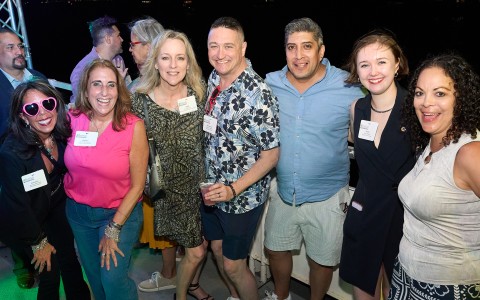 a group of people posing for a photo