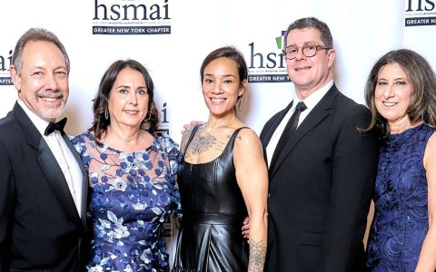 a group of people posing for a photo