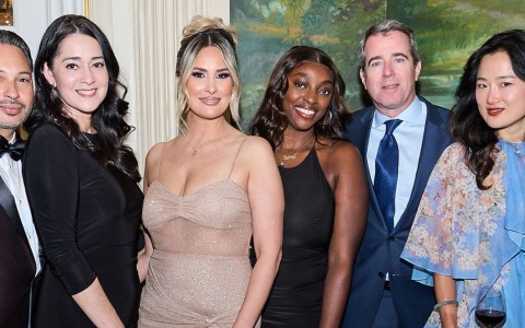 a group of people posing for a photo