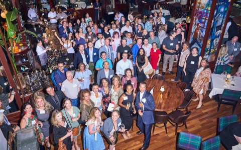 a group of people posing for a photo
