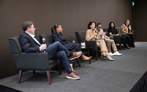 a group of people sitting in chairs