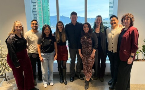 a group of people posing for a photo