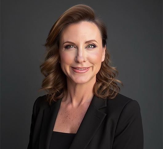 a woman in a black suit