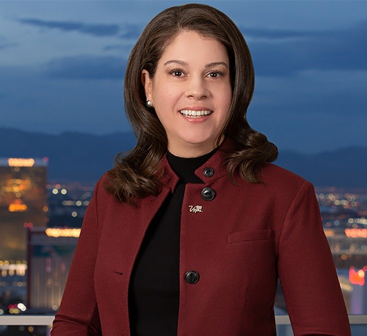 a woman smiling at the camera