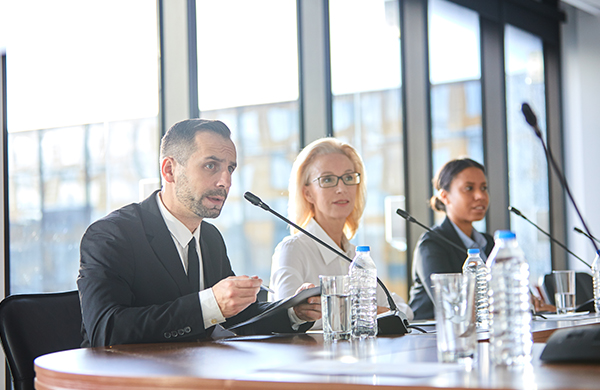 a group of people sitting at a table