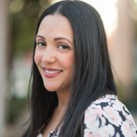 a woman smiling at the camera