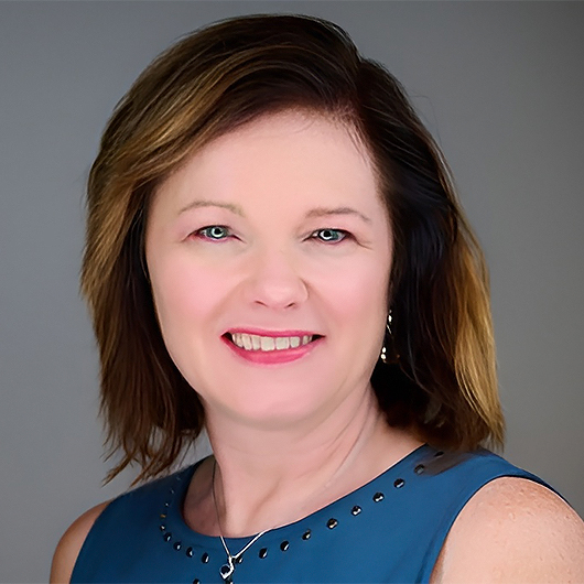 a woman smiling at camera