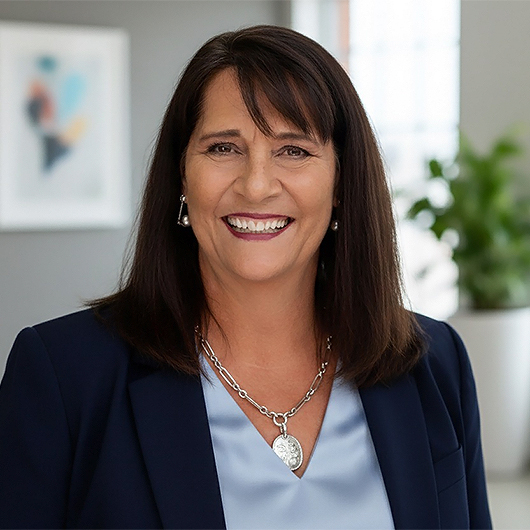 a woman smiling at camera