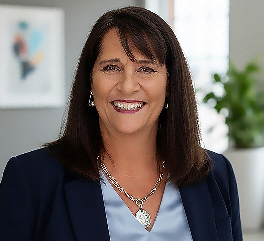 a woman smiling at camera