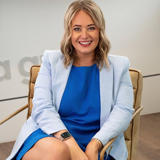 a woman sitting in a chair
