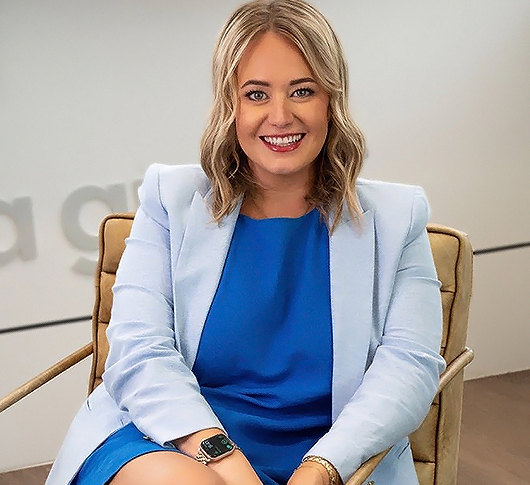 a woman sitting in a chair