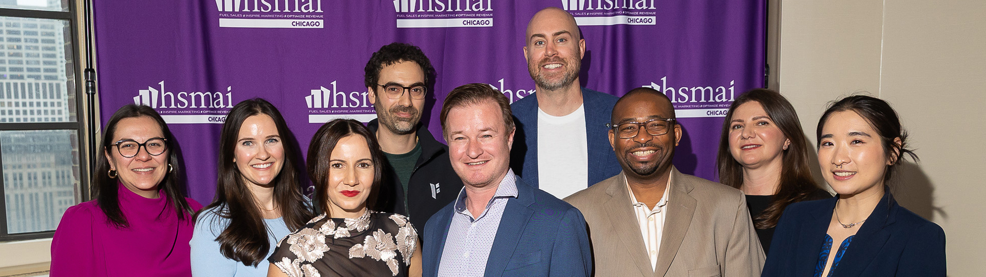 a group of people posing for a photo