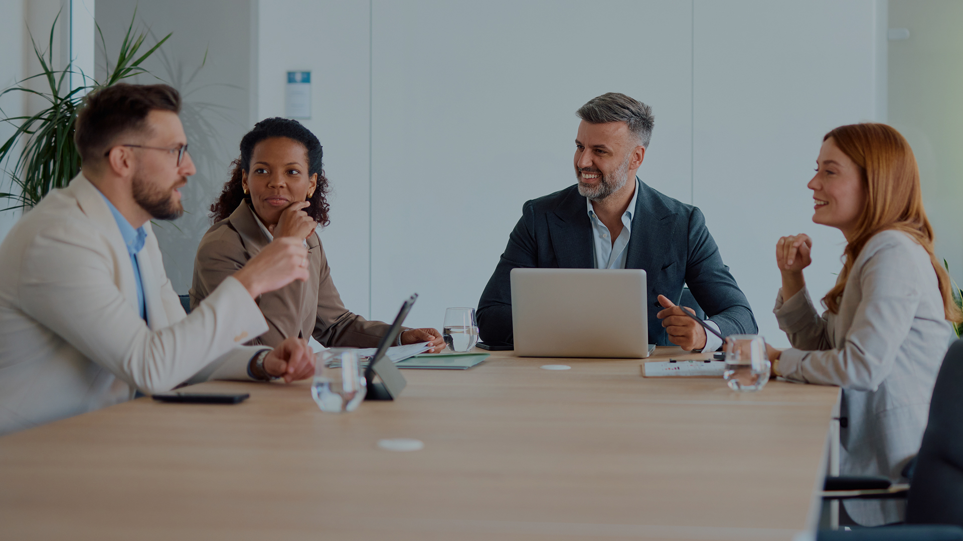 a group of people sitting at a table
