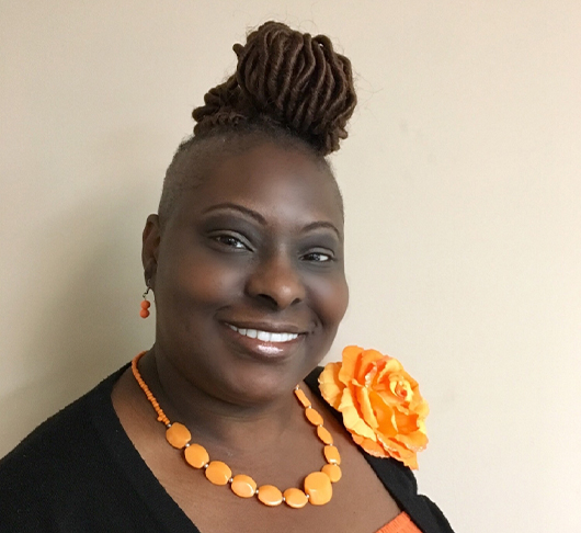 a woman smiling for a picture