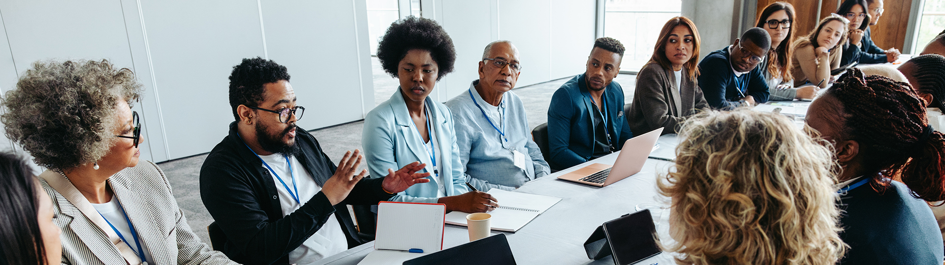 a group of people sitting at a table