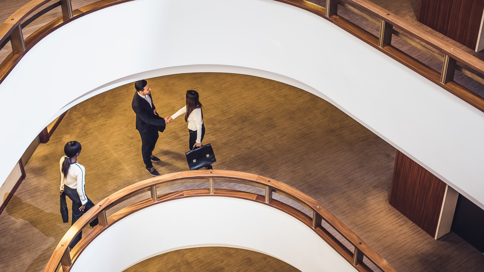 a man and woman shaking hands