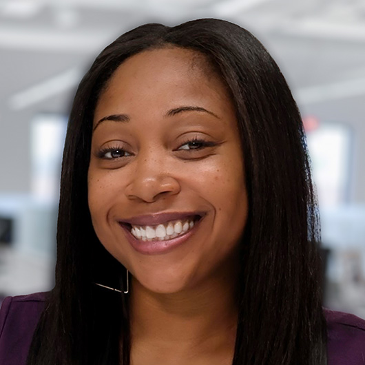 a woman smiling at camera