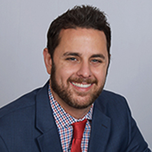 a man in a suit and tie