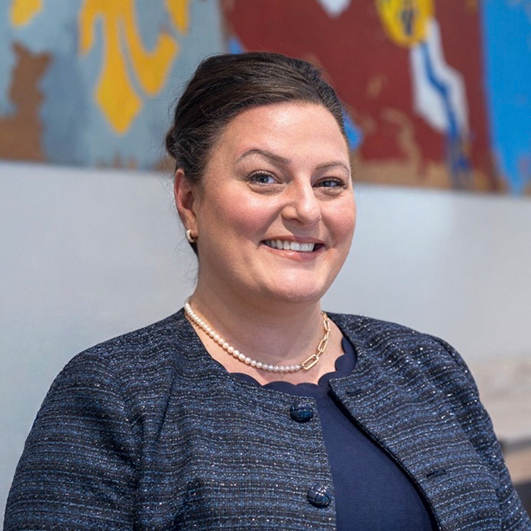 a woman smiling at camera