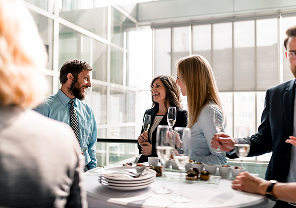 a group of people having a conversation