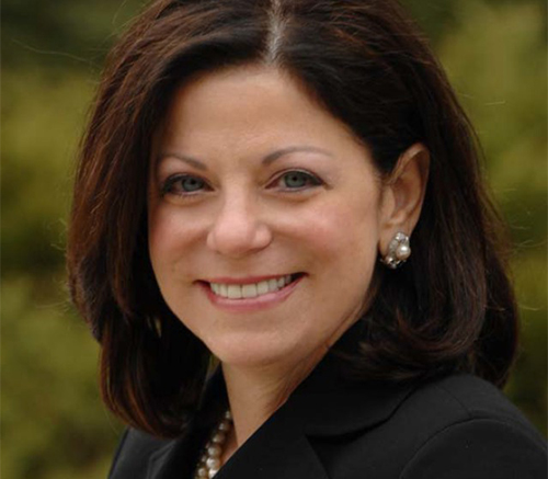 a close-up of a woman smiling