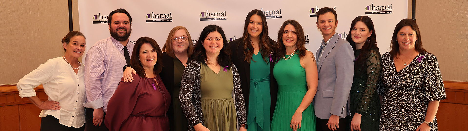 a group of women posing for a photo