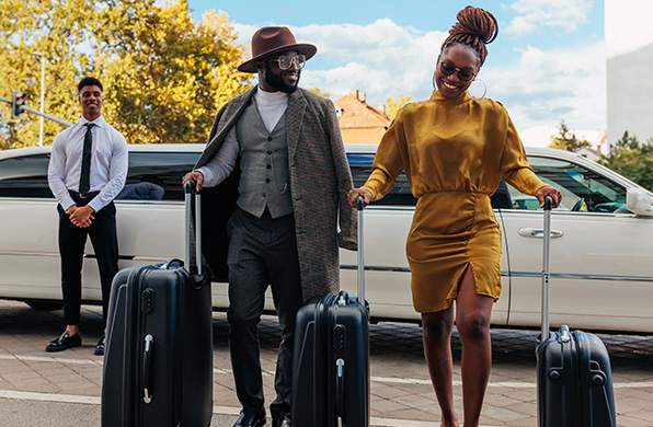 a group of people with luggage