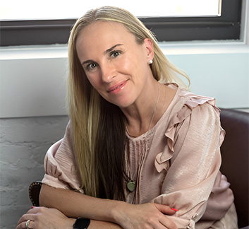 a woman sitting on a couch