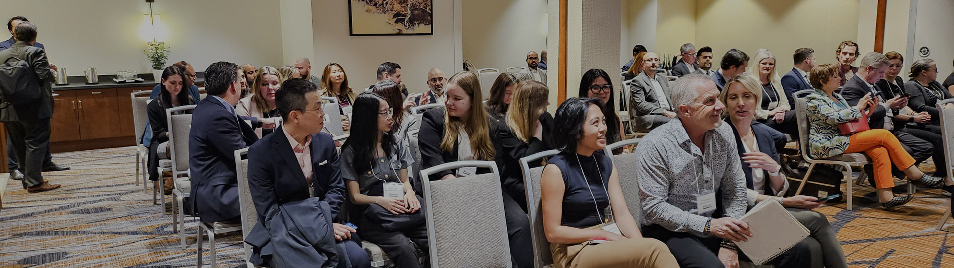 a group of people sitting in chairs