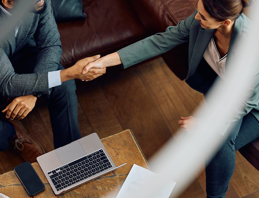 a man and woman shaking hands