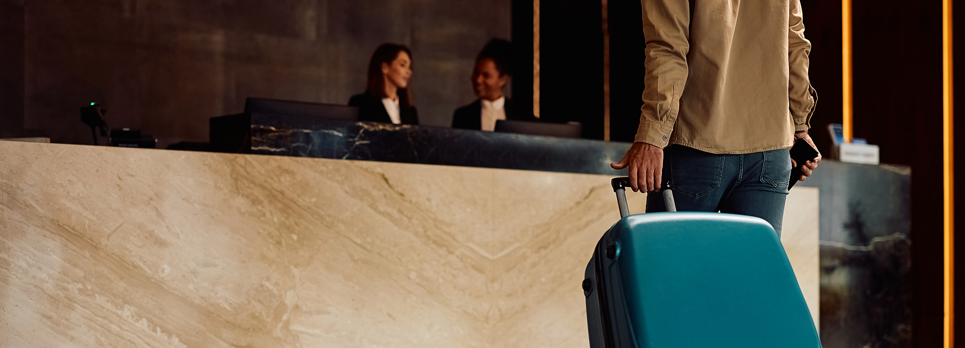 a man holding a suitcase