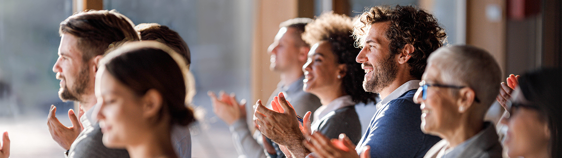a group of people clapping