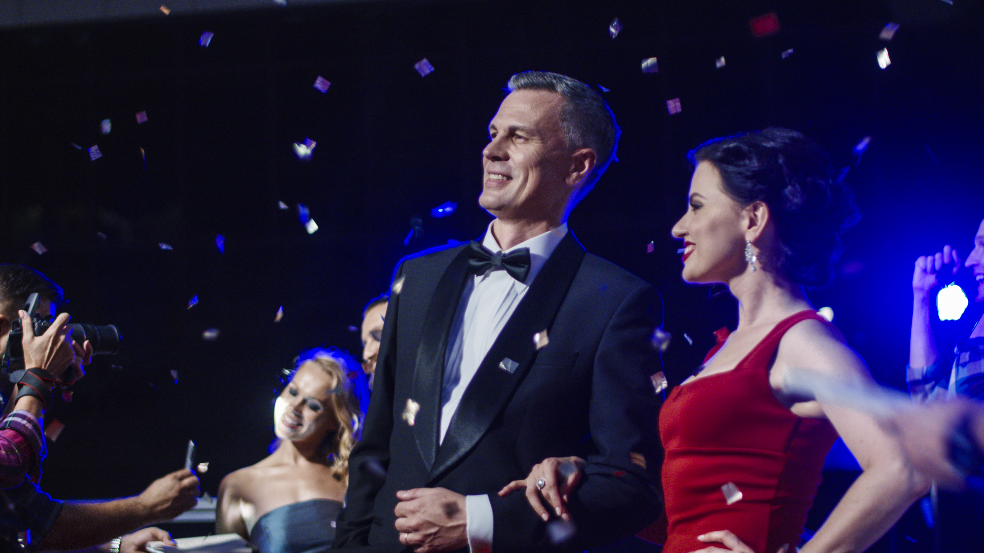 a man and woman in a suit and tie