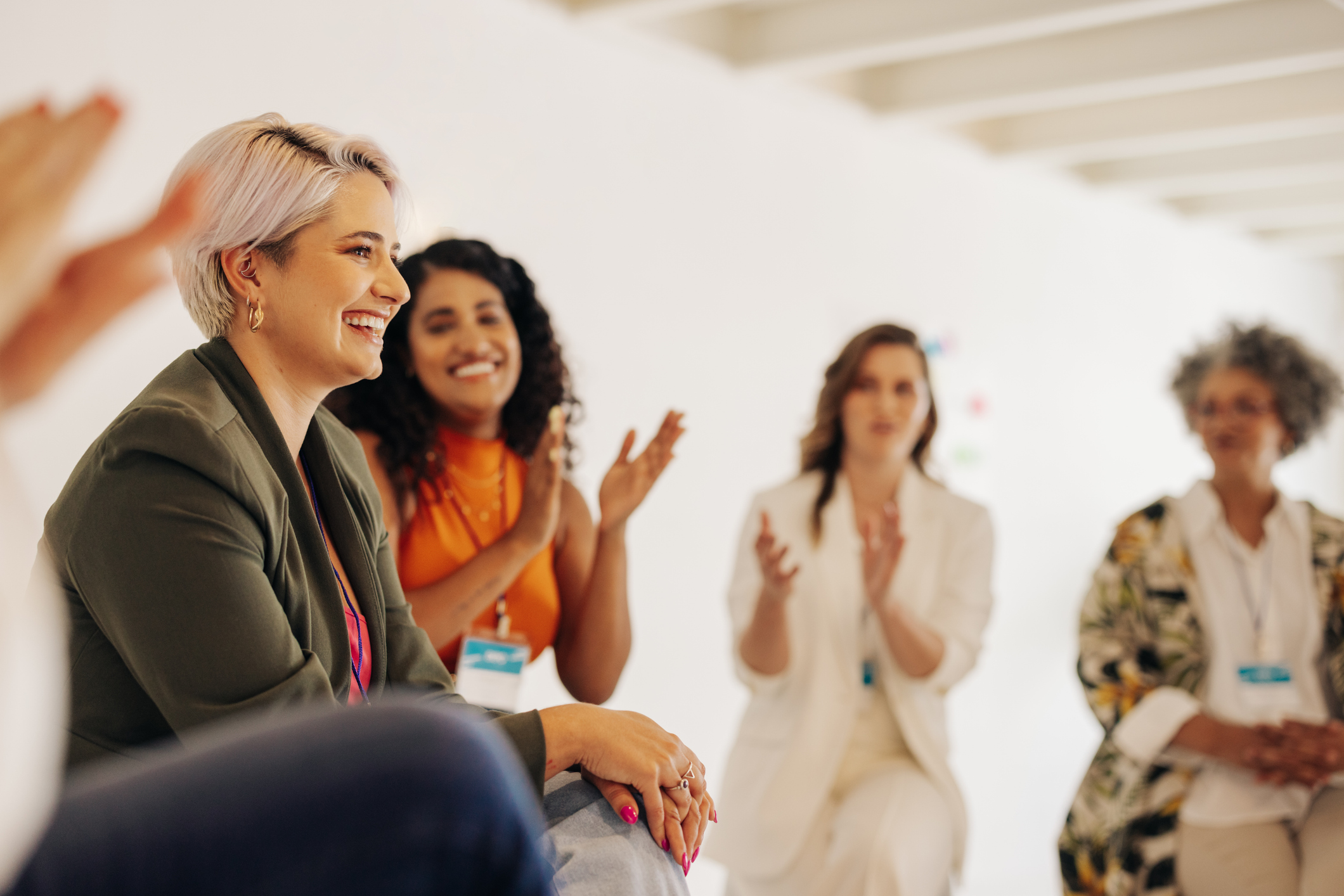 a group of women clapping