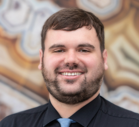 a man smiling for the camera