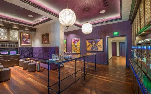 a room with a table and chairs